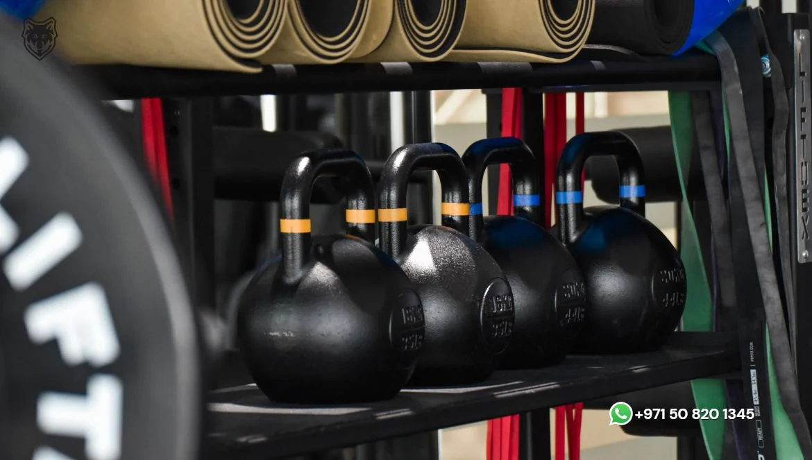 Kettlebell rack with resistance bands at Lucky's Gym